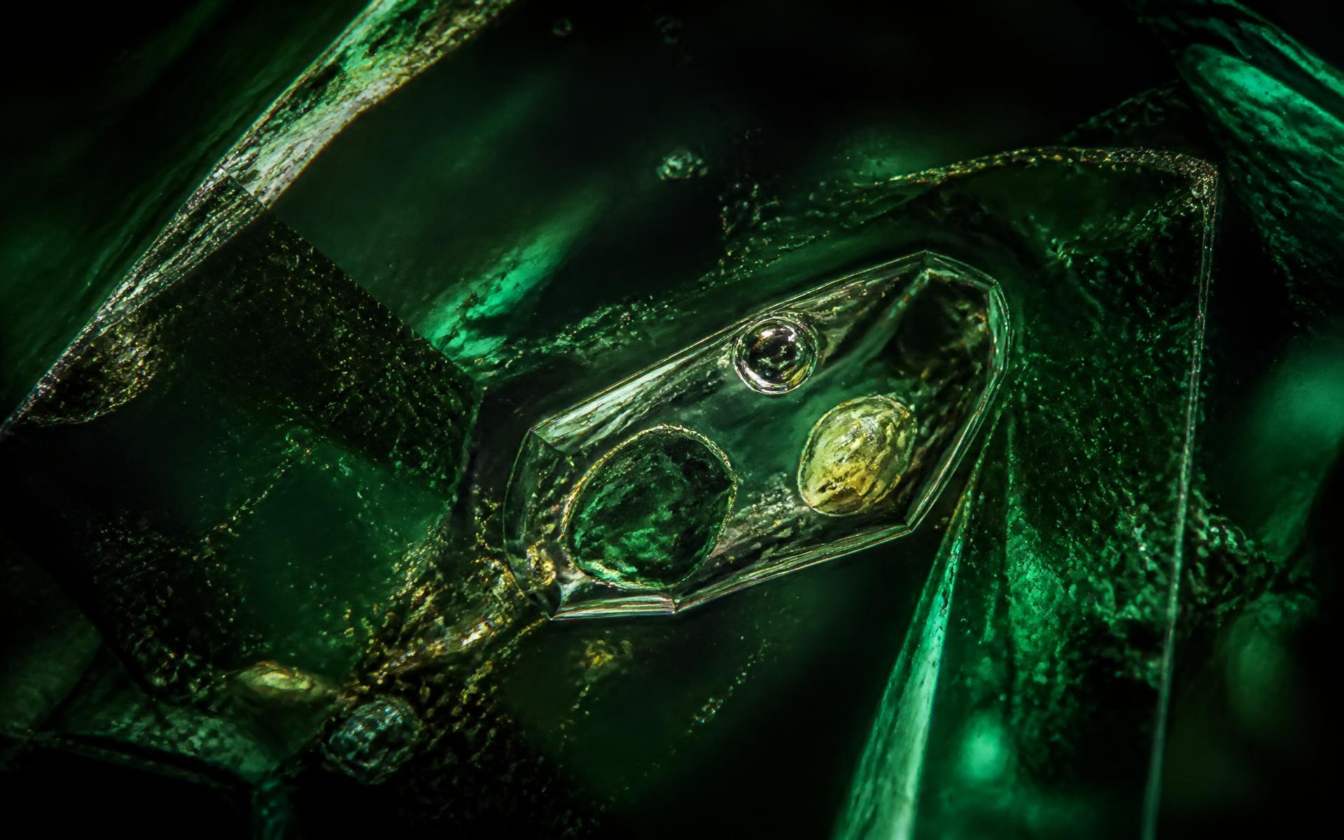 Photomicrograph of an emerald interior revealing natural inclusions